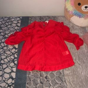 red ruffle blouse